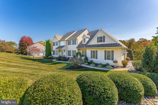 view of front of house with a front lawn