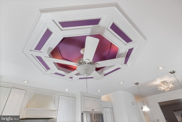 details featuring pendant lighting, a ceiling fan, refrigerator, recessed lighting, and white cabinets