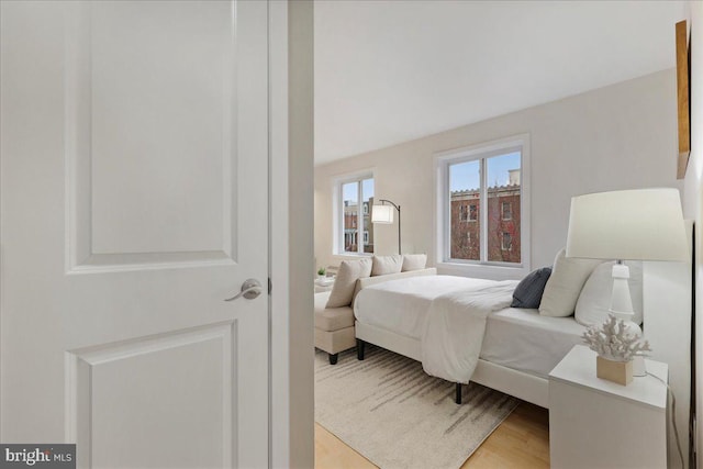 bedroom featuring light wood-type flooring