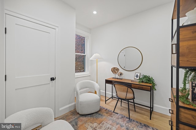 office area with hardwood / wood-style flooring