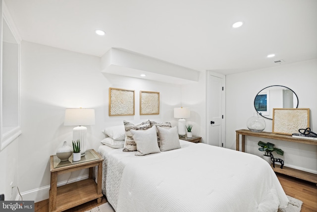 bedroom featuring hardwood / wood-style floors