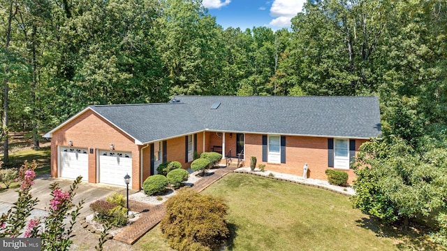 single story home with a garage, brick siding, a shingled roof, driveway, and a front yard