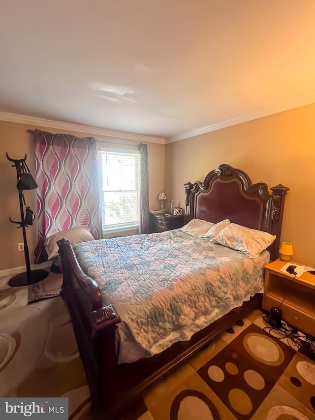 bedroom with crown molding