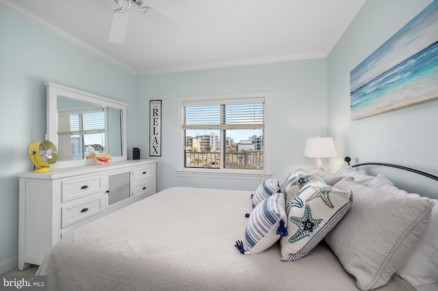 bedroom featuring multiple windows, ceiling fan, and crown molding