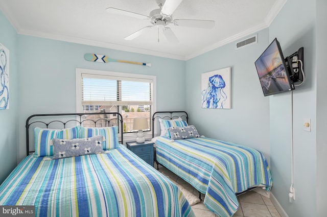 bedroom featuring crown molding, light tile patterned floors, and ceiling fan