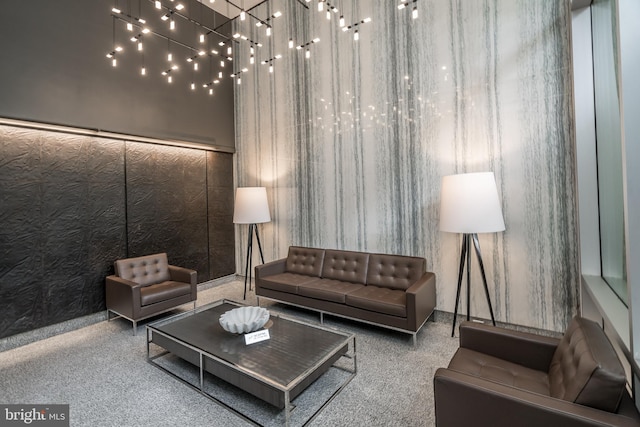 living area featuring speckled floor