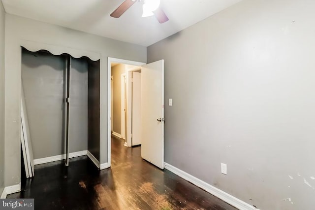 bedroom featuring dark wood-type flooring and ceiling fan