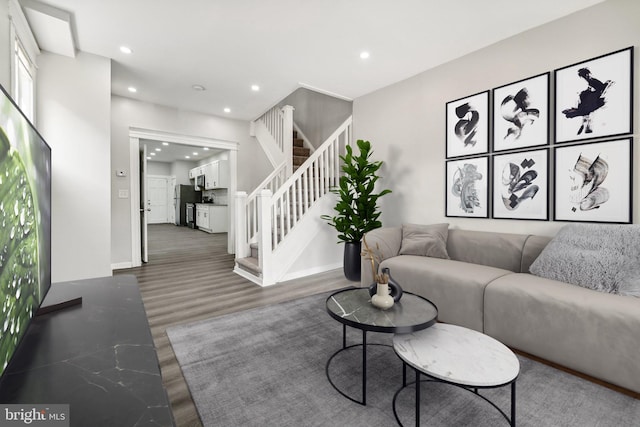 living room featuring dark hardwood / wood-style floors