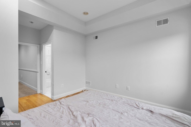 empty room with hardwood / wood-style floors