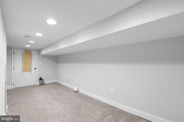 basement with carpet flooring