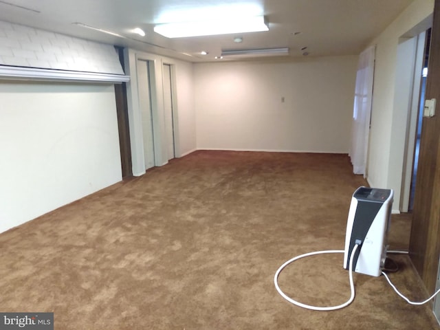 basement with carpet flooring