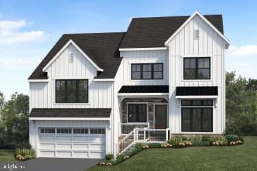 modern farmhouse style home featuring an attached garage, driveway, board and batten siding, and a front yard