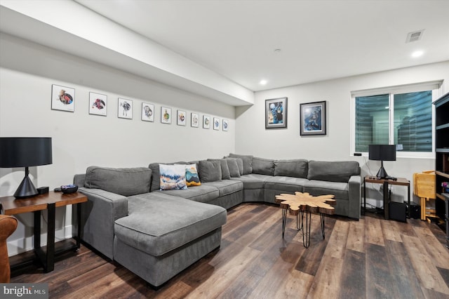 living area featuring wood finished floors, visible vents, and recessed lighting