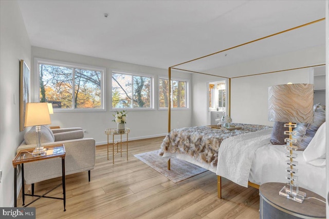 bedroom with light hardwood / wood-style flooring