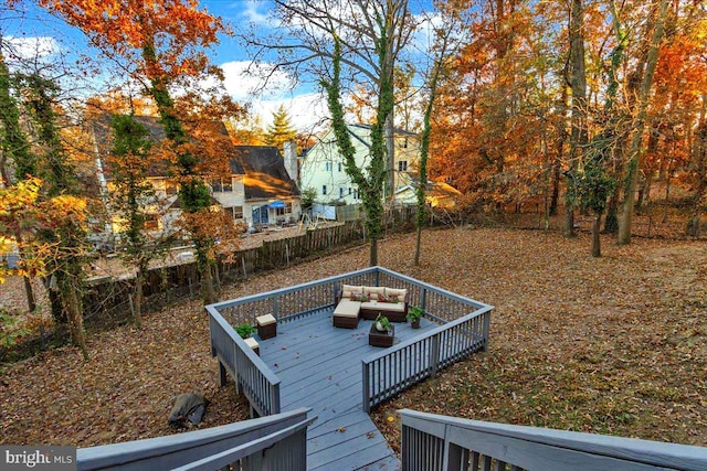 view of yard featuring outdoor lounge area and a wooden deck