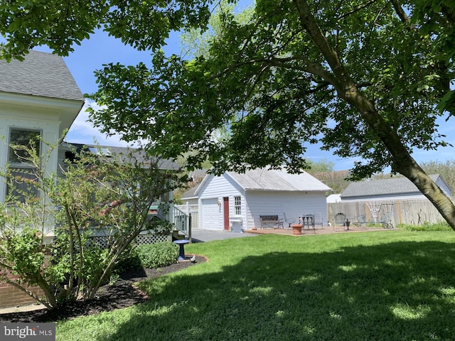 view of yard featuring a patio area and fence