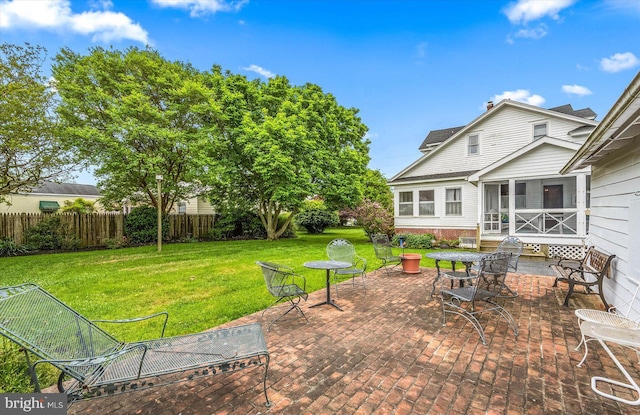 view of patio with fence