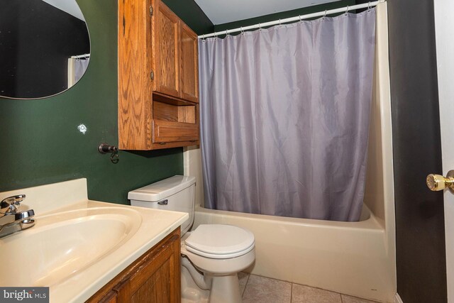 full bathroom featuring tile patterned flooring, vanity, shower / bathtub combination with curtain, and toilet