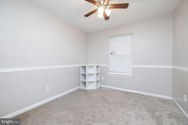 unfurnished room with light carpet and ceiling fan