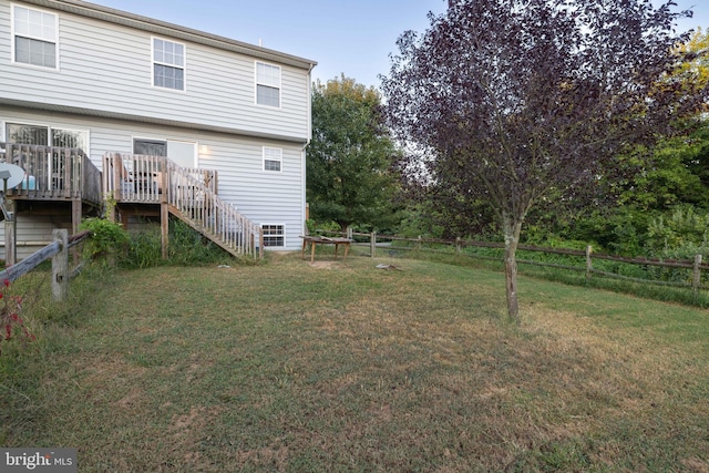 view of yard featuring a wooden deck