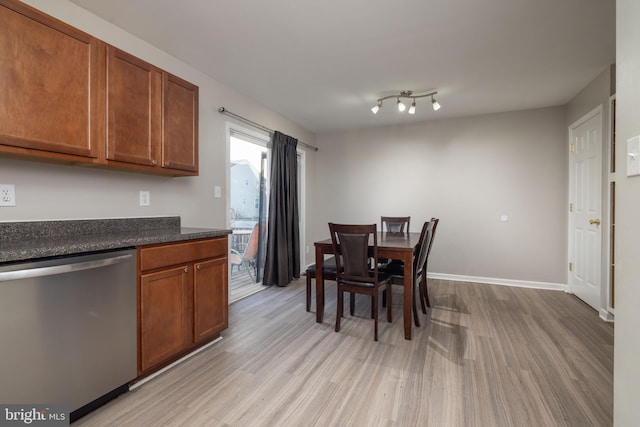 interior space with dishwasher and light hardwood / wood-style floors