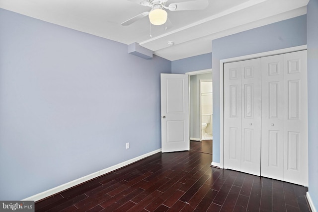 unfurnished bedroom featuring a closet, ceiling fan, and dark hardwood / wood-style floors