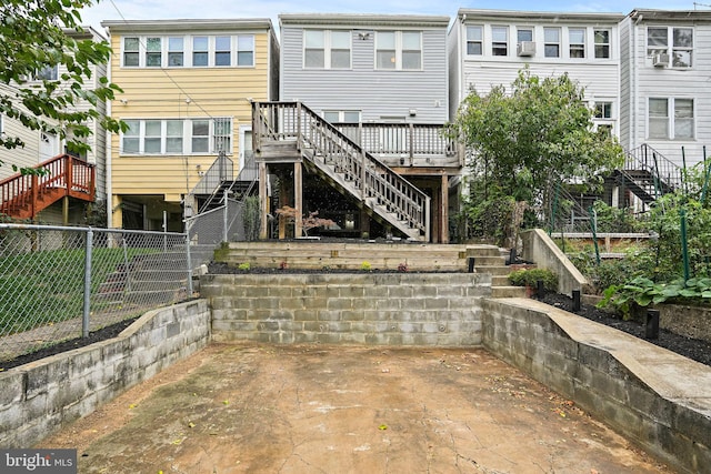 rear view of property featuring a patio