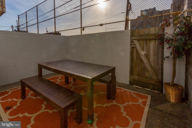 view of patio featuring fence