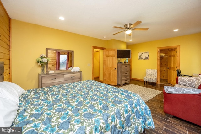 bedroom featuring ceiling fan and dark hardwood / wood-style floors