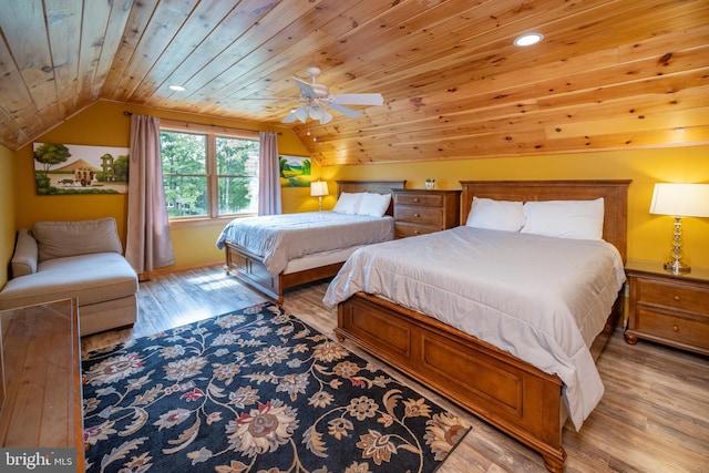 bedroom featuring light wood-type flooring, ceiling fan, lofted ceiling, and wooden ceiling