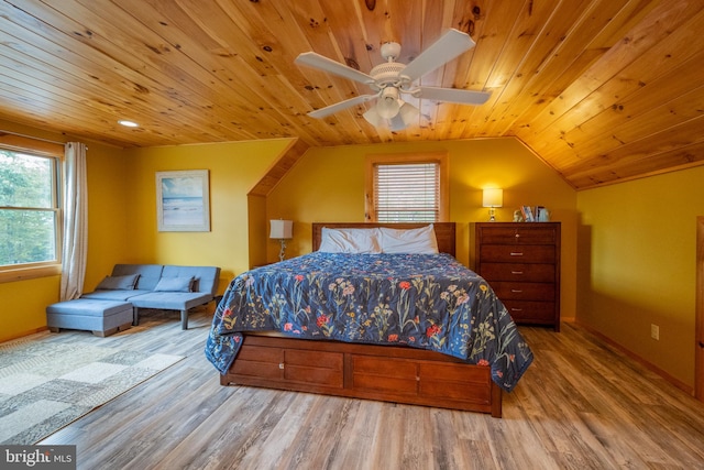 bedroom with light wood-type flooring, ceiling fan, lofted ceiling, and wooden ceiling