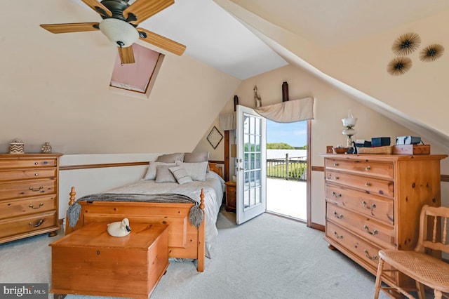 bedroom featuring vaulted ceiling, access to outside, ceiling fan, and carpet flooring