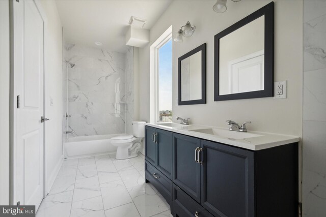 full bathroom with vanity, toilet, tiled shower / bath combo, and tile patterned floors