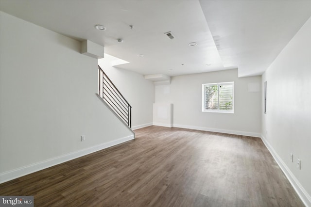 empty room featuring dark hardwood / wood-style floors