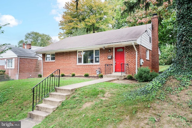 view of front facade with a front yard