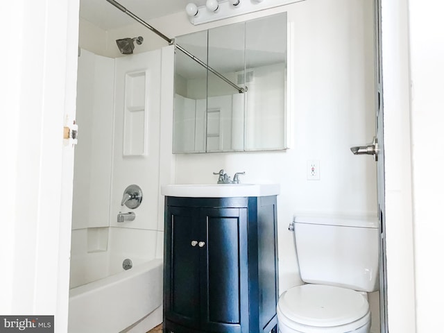 full bathroom with toilet, vanity, and shower / bath combination