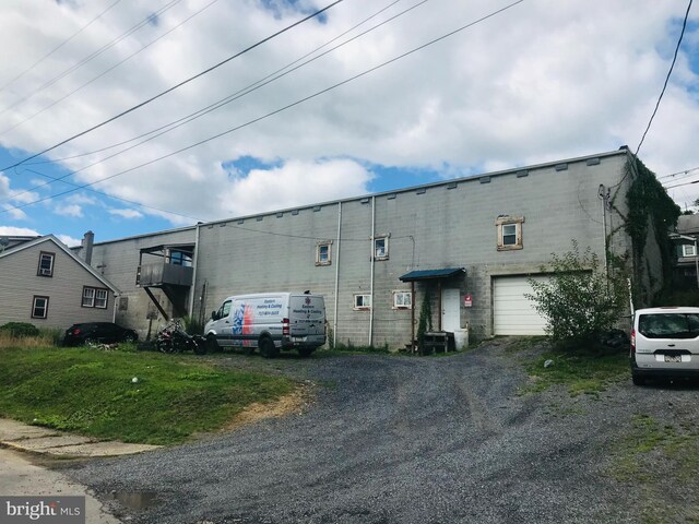 view of building exterior with a garage