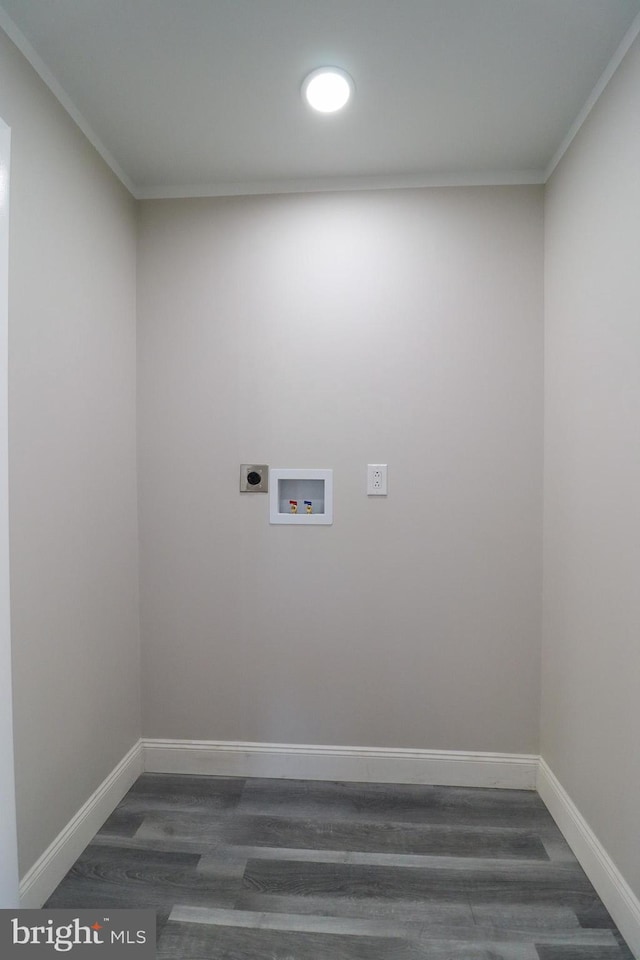 laundry room with ornamental molding, dark wood-type flooring, washer hookup, and electric dryer hookup