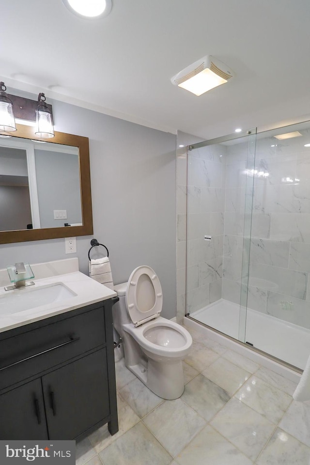 bathroom featuring walk in shower, toilet, and vanity