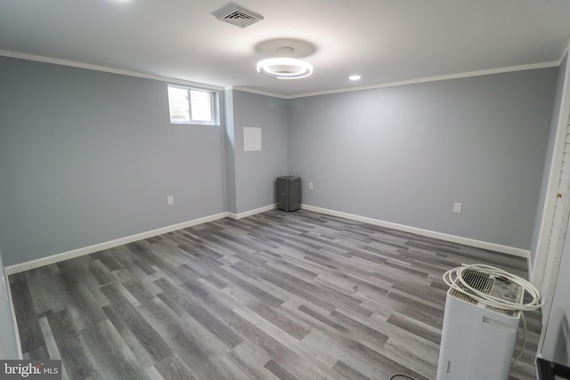 interior space featuring ornamental molding and wood-type flooring