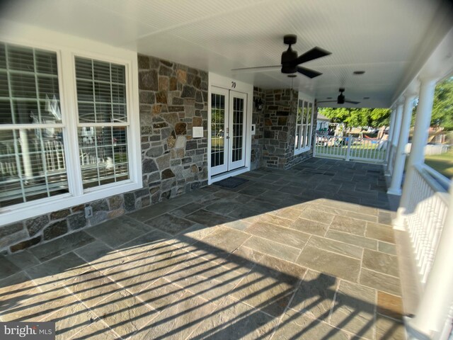 view of patio / terrace with ceiling fan and french doors