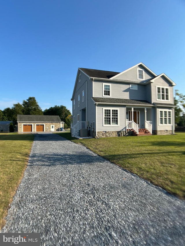 view of property with a front yard, central AC unit, and a porch