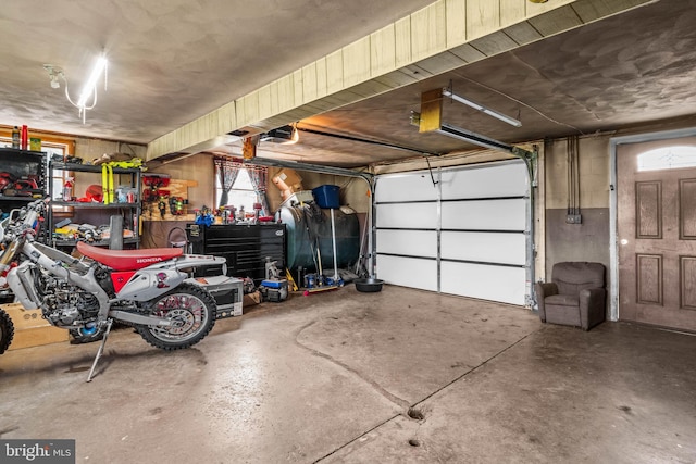 garage featuring a garage door opener