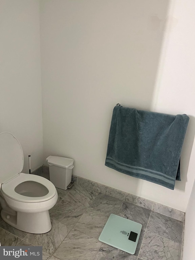 bathroom featuring toilet