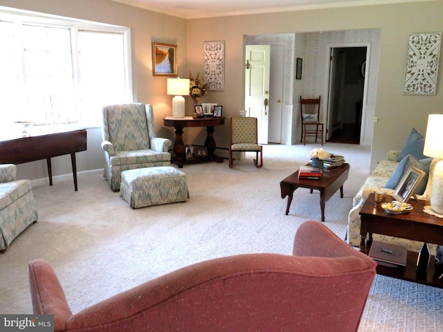 living room featuring carpet and ornamental molding