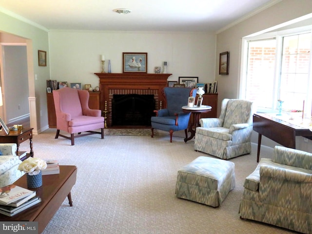 living room with crown molding, light carpet, and a fireplace