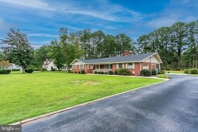 ranch-style house with a front yard