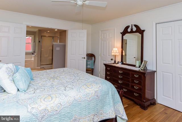 bedroom featuring crown molding, ceiling fan, connected bathroom, and light hardwood / wood-style floors