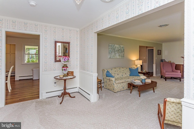 living room featuring crown molding, hardwood / wood-style floors, and a baseboard radiator