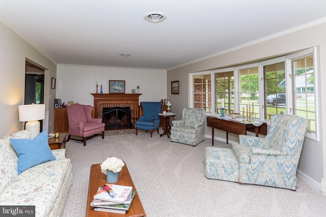 living room with crown molding, a brick fireplace, and carpet floors